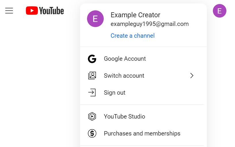 A screenshot of a YouTube page for someone named "Example Creator" with the avatar selected so a dropdown appears with the option "Create a channel" appearing as a link below the username.